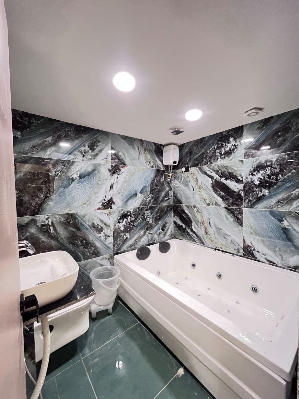 Private jacuzzi in marble bathroom